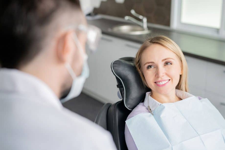 woman in dental chair smiling